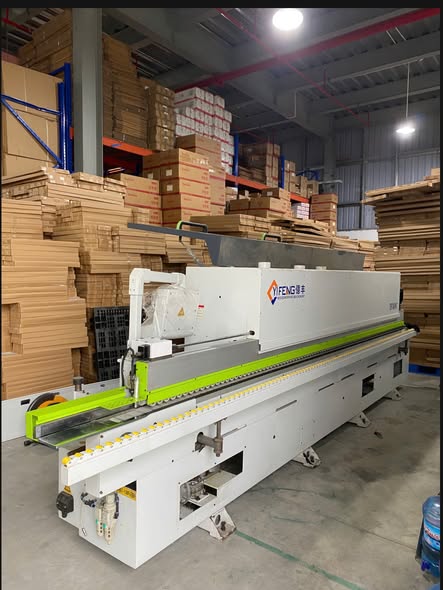 Kho E còn 1 MÁY DÁN CẠNH 5CN